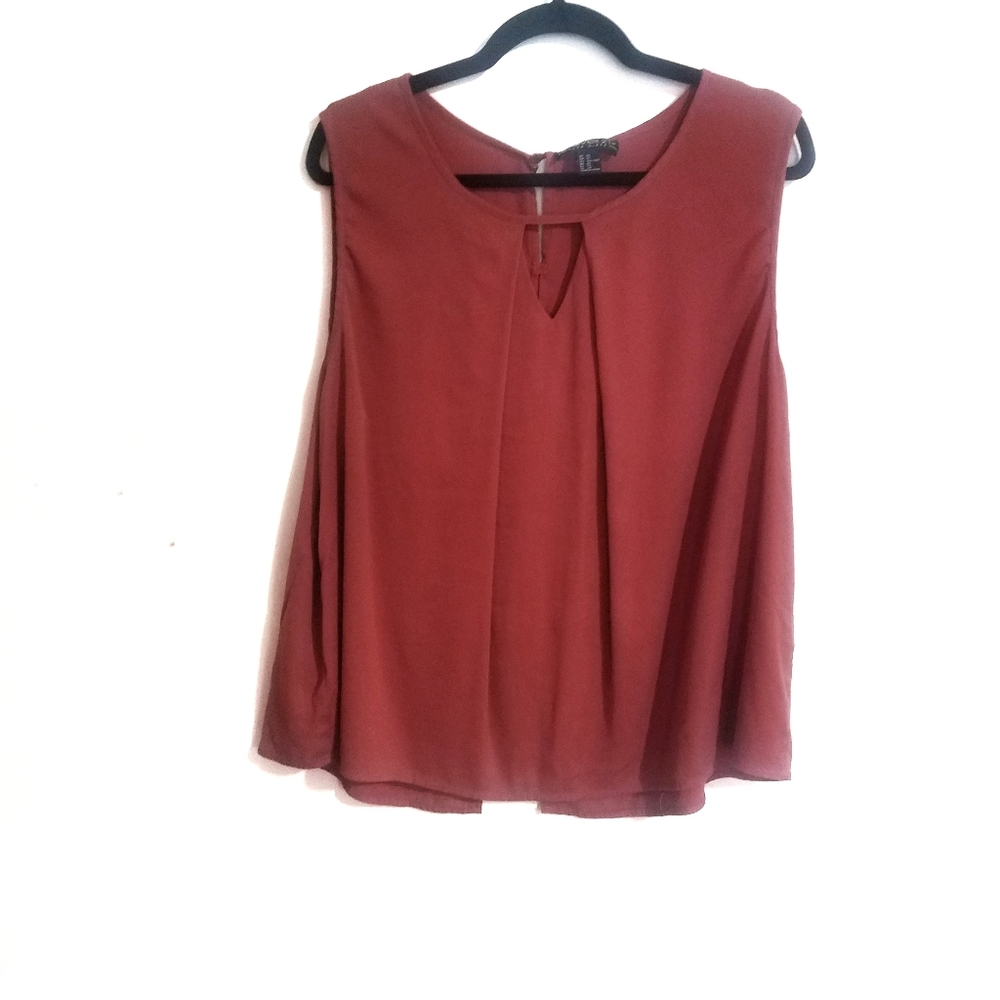 Forever 21 sleeveless top. Open in the back